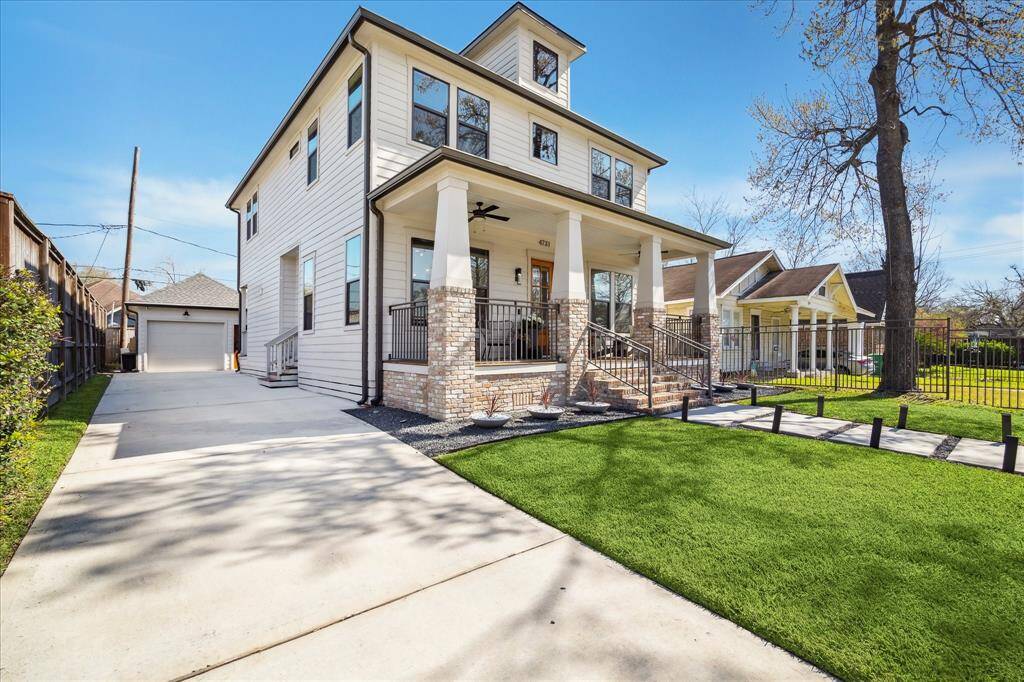 Another view of this amazing property! Plenty of off street parking. Side door giving easy access to the house.