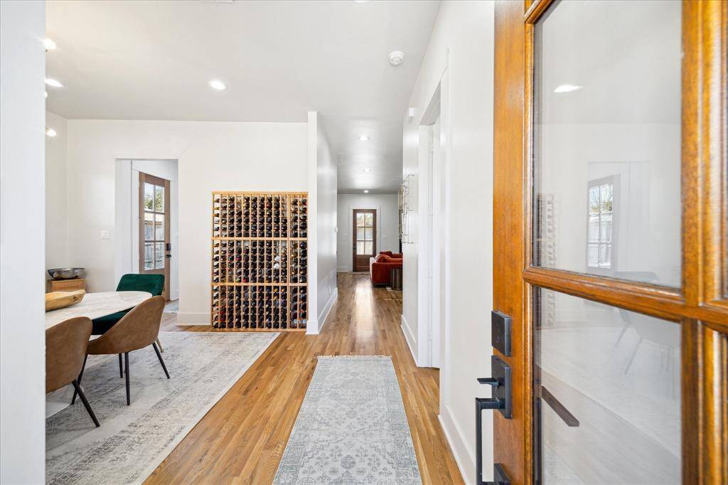 Bright and inviting entryway opening into the dining area. You will find beautiful hardwood floors, high ceiling and lots of natural light.