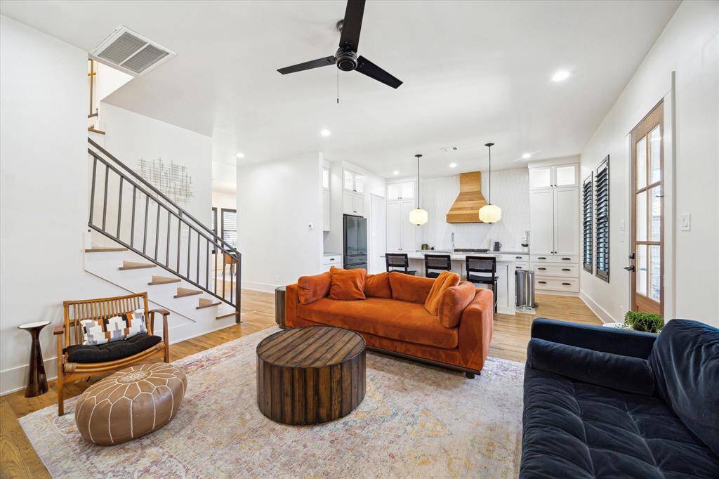 Bright, open-concept living area seamlessly connected to the kitchen