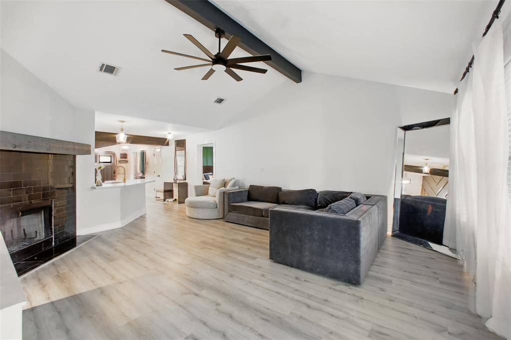 Open Concept Living Area with Vaulted Ceiling