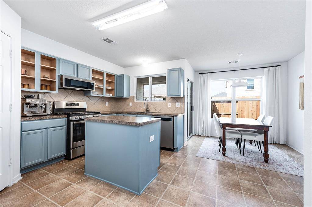 Lots Of Cabinets For Storage And A Walk In Pantry.