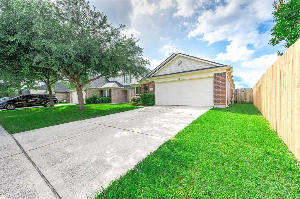 Two Car Garage With Double Wide Driveway And Street Parking.