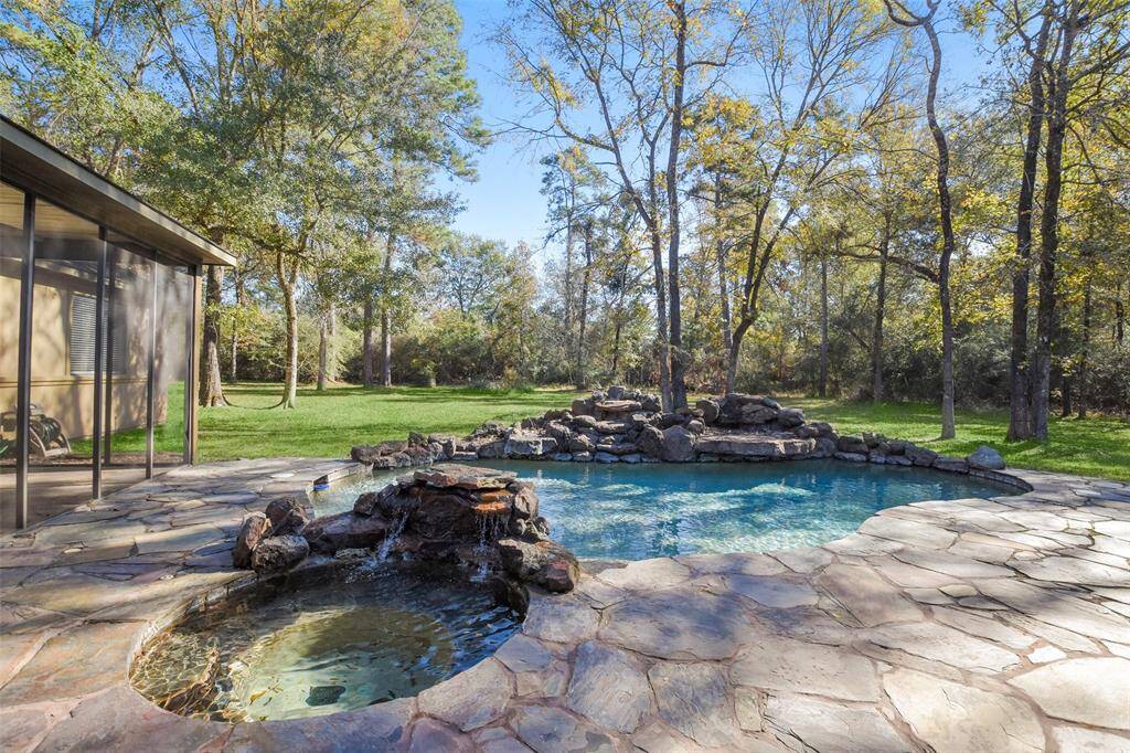 Beautiful pool with stone waterfalls.