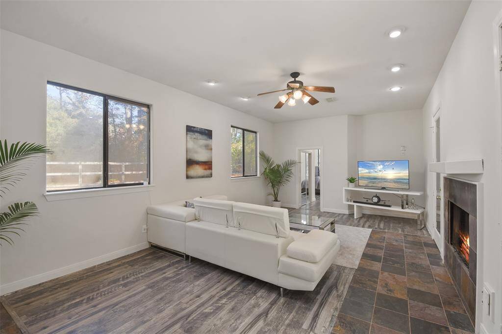 The family room features a cozy fireplace,
