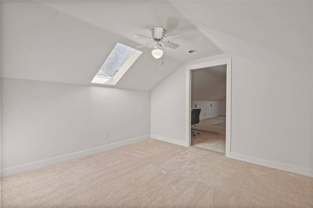 This flex room is located above the guest quarters, and connects to the gameroom.