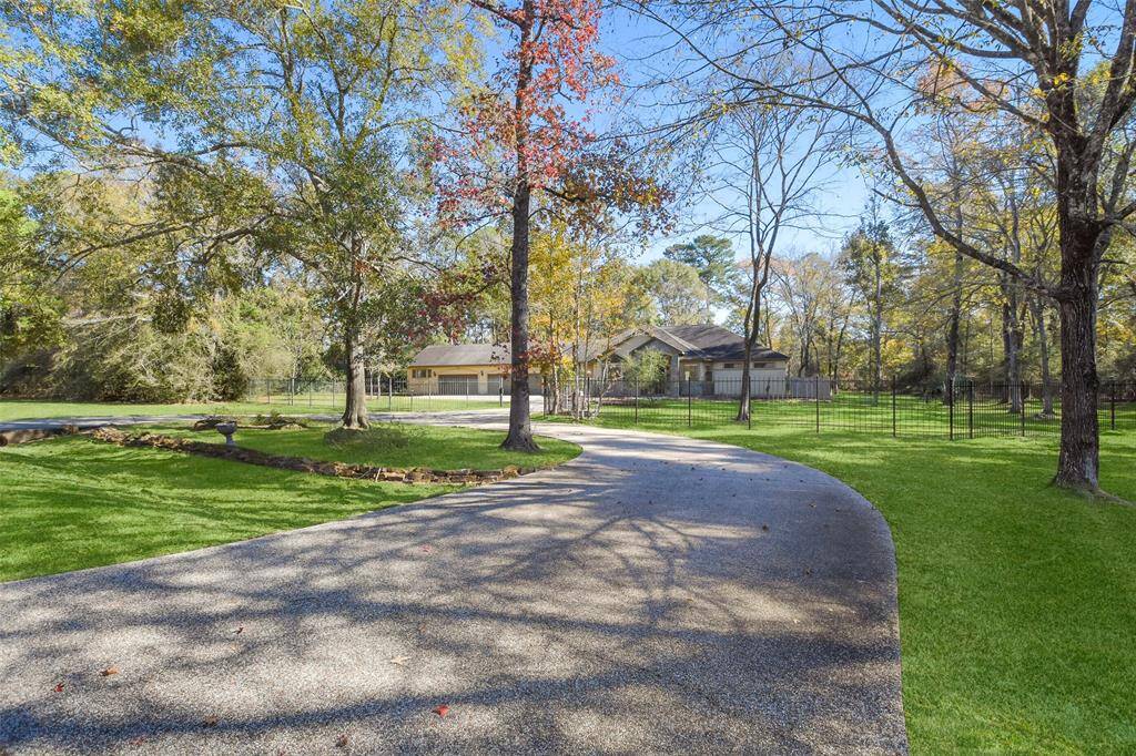 With a circle drive and four car garage, there is ample room for parking.