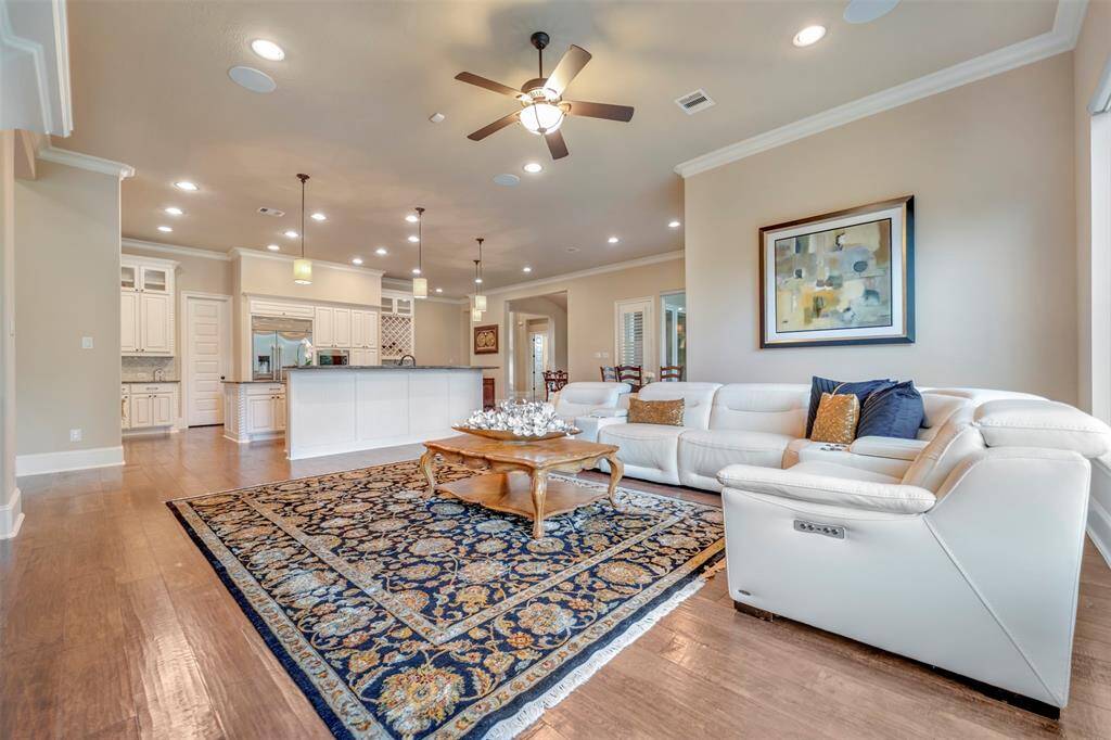 The family room is large in scale to hold all the furniture you want to bring.  It is a very flexible and lovely space.