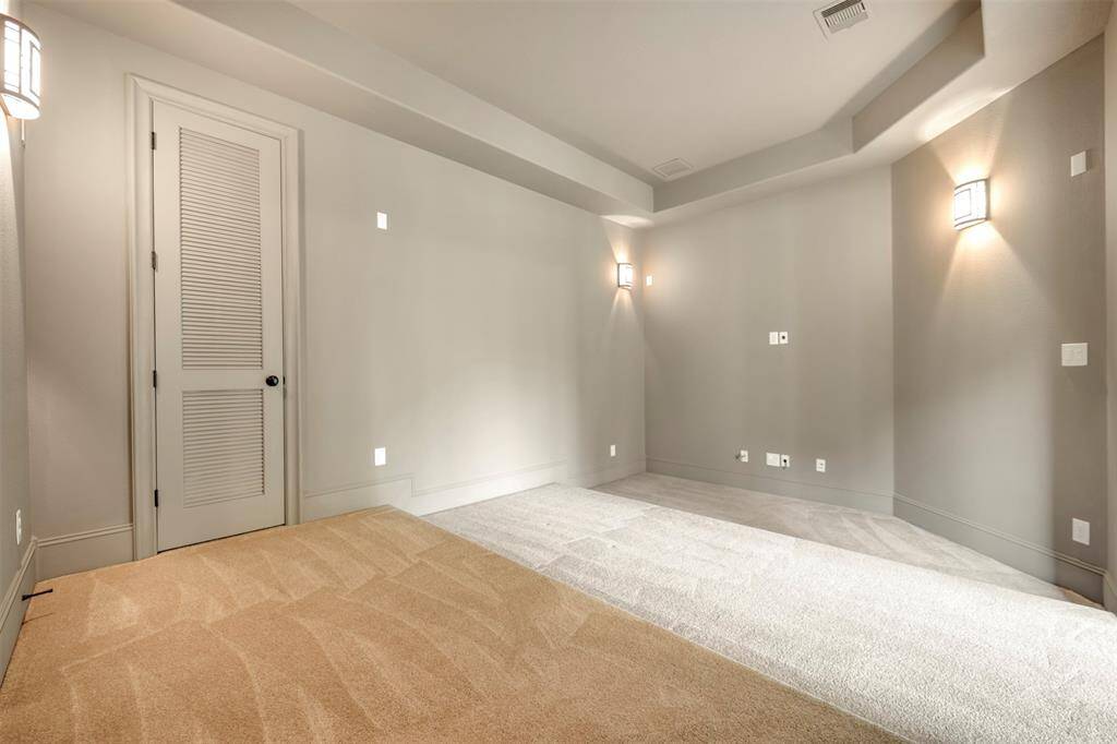 The media room is also Downstairs.  The perfect spot to watch a movie, the SuperBowl or the Olympics on your own personal big screen!  Pass the popcorn, please!