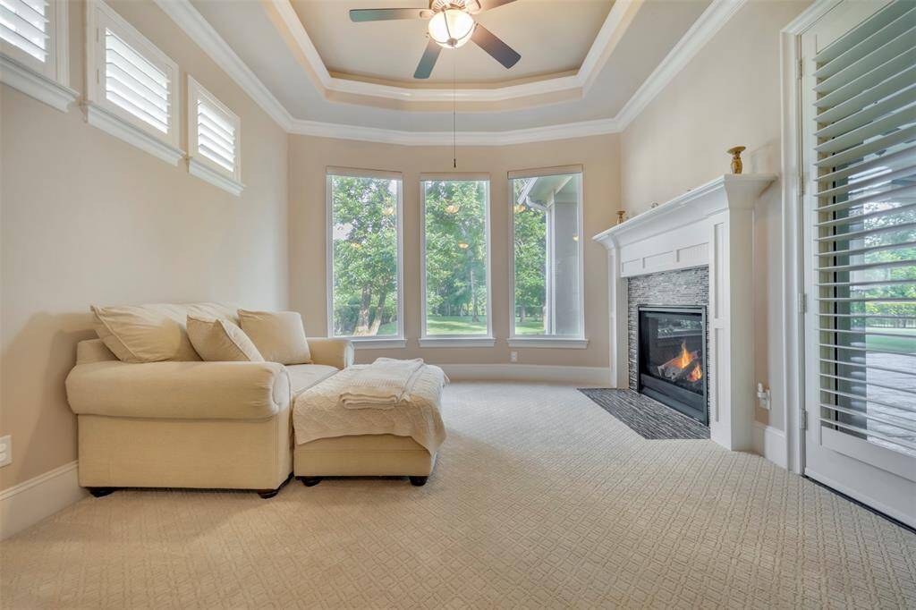 This lovely sitting area with recessed lighting in the tray ceiling is a wonderful place to read, meditate and drink your coffee on the weekends.  Leisurely approach the upcoming day in this cozy space.
