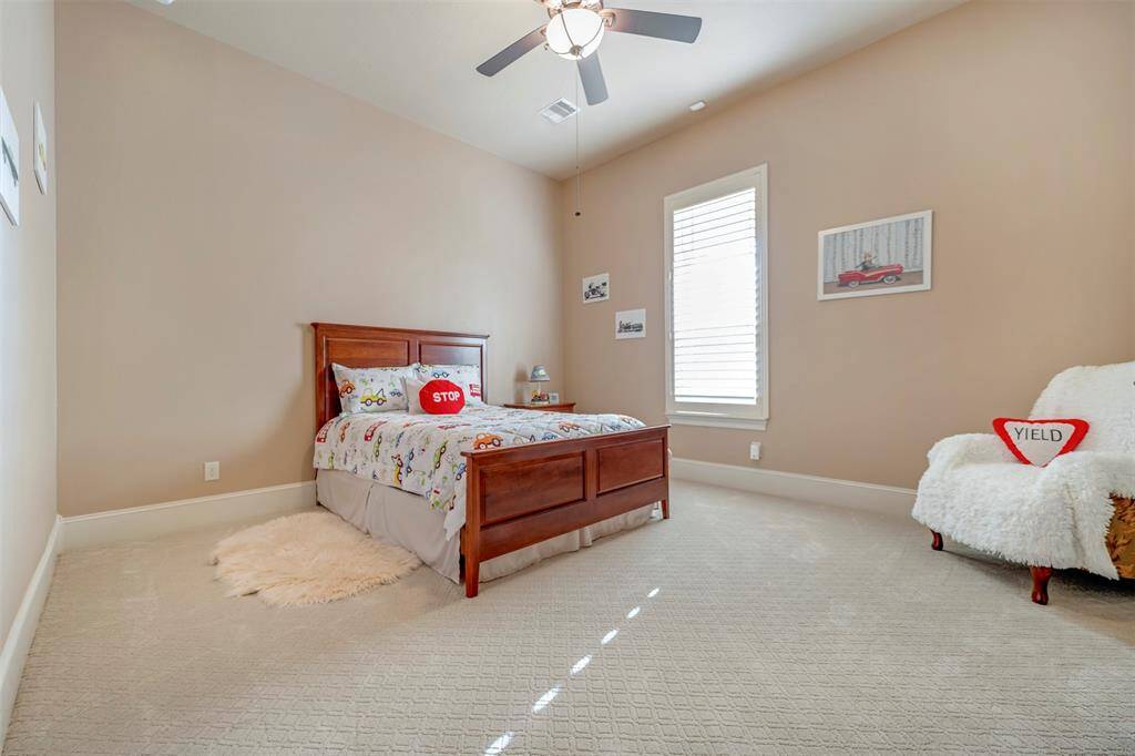 Second bedroom DOWNSTAIRS is also spacious with a large walk in closet.  Easy access off of the kitchen, it is also very private.  The perfect place for guests, grandparents, college students, or a nursery.  Possibilities are as vast as your needs.