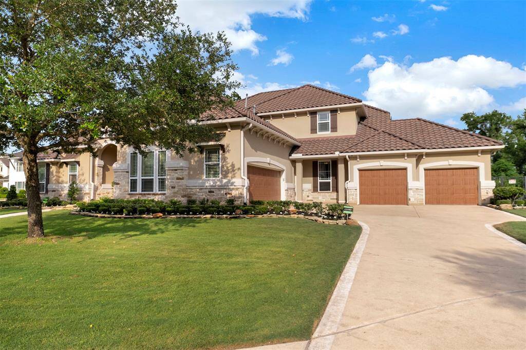 Yep! That's right---it's a FOUR car garage to house all the cars and toys along with a double wide driveway to make parking a breeze!