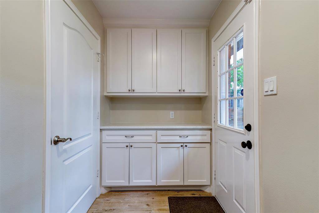 Utility room/washer and dryer area.