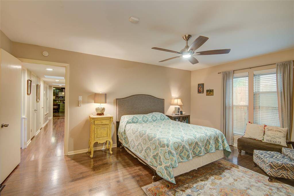 The Primary bedroom offers a peaceful retreat with a view toward the hallway, providing easy access to the rest of the home.