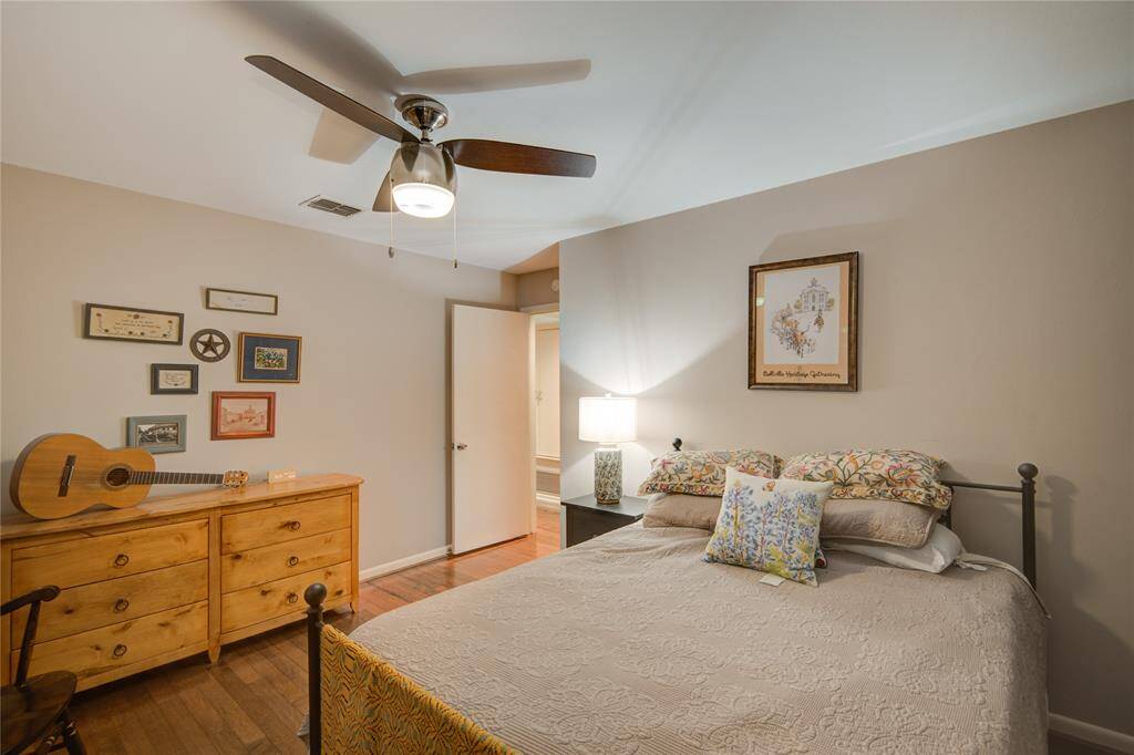 From this angle, the guest room offers a view into the hallway, maintaining a natural flow between the spaces.