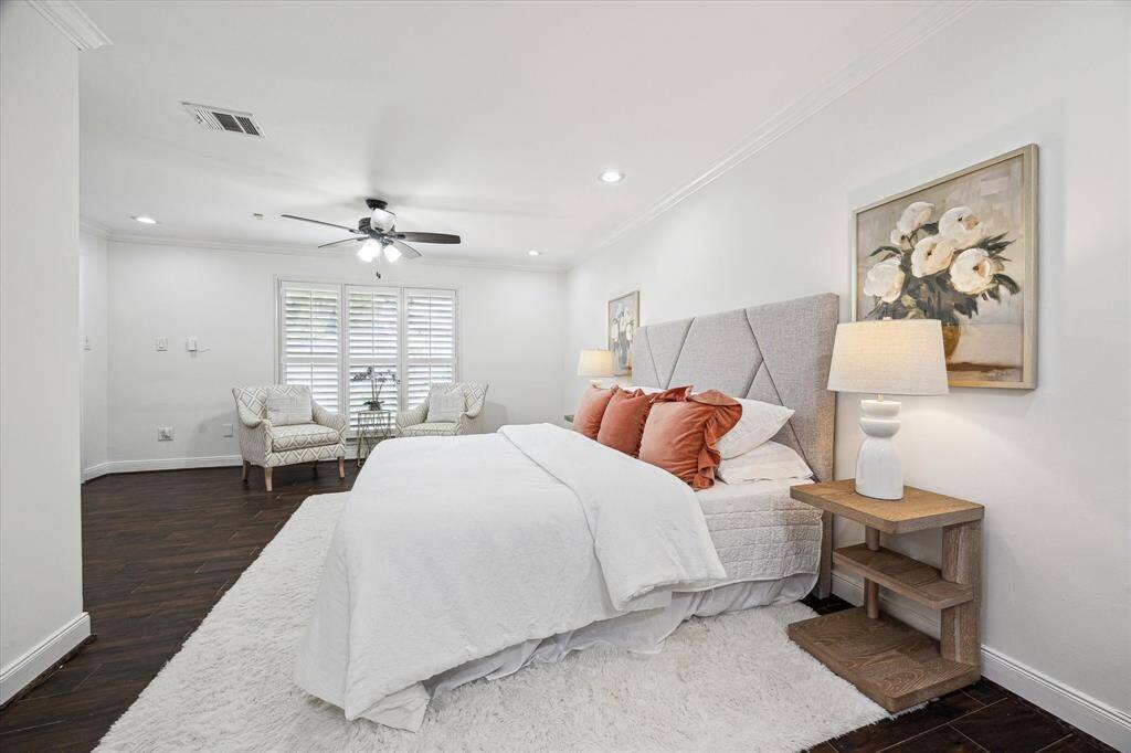The primary suite is large and spacious and has its own ensuite bath. It overlooks the backyard.