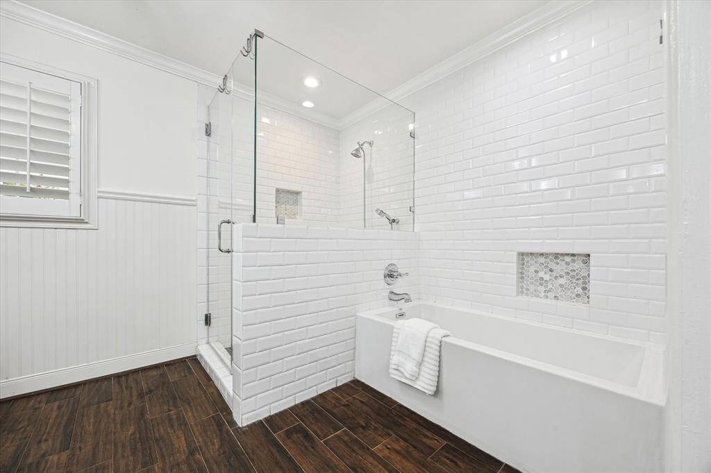 The Primary bath has a separate shower and soaking tub.