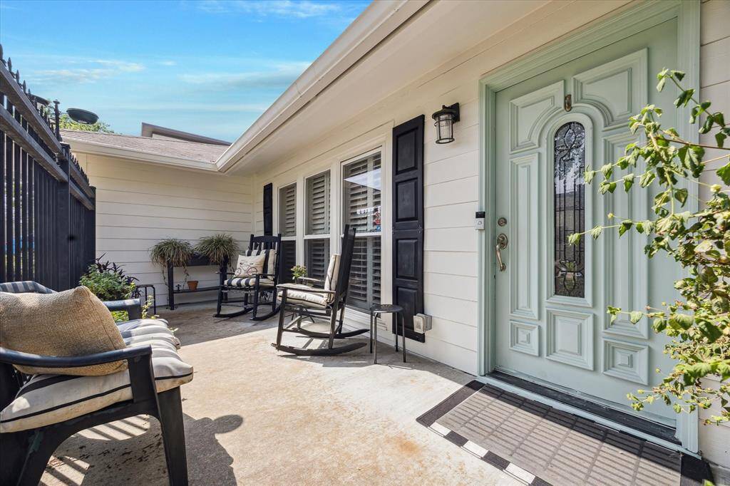 The gated front porch is perfect for pets.