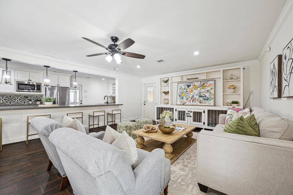 The Kitchen is open to the living room and has seating for the breakfast bar.