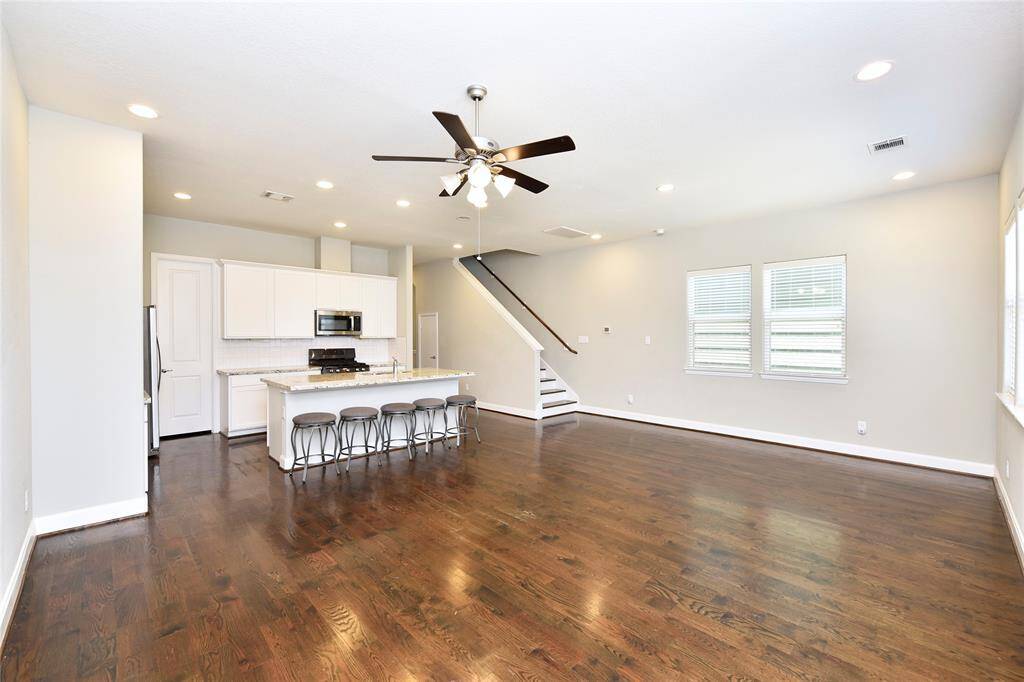 The open-concept dining and living area offers plenty of space for everyone to enjoy!