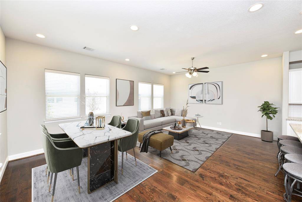 Virtually Staged Dining and Living Area, showcasing the full potential of this spacious layout.