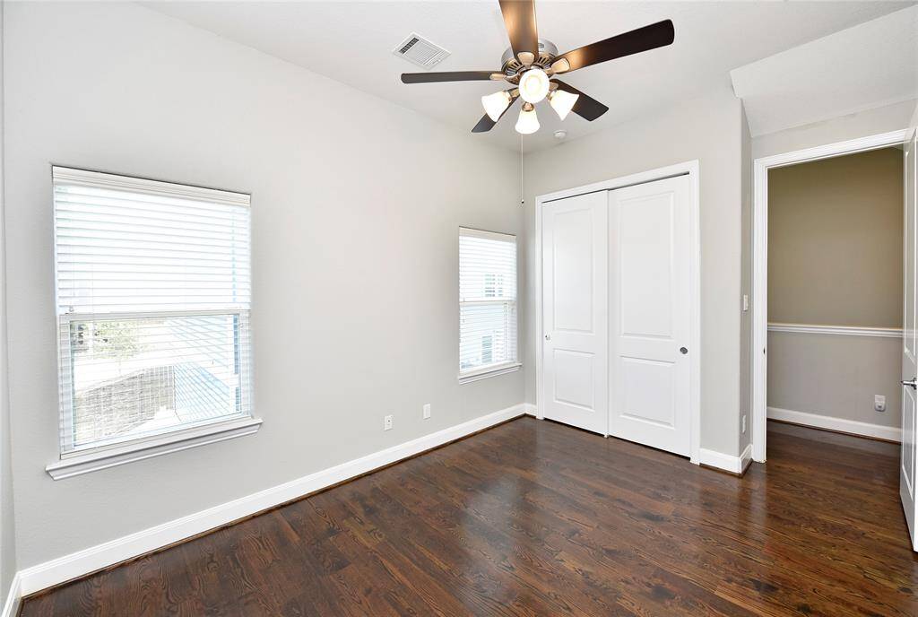 "Another view of the spacious secondary bedroom on the second floor."