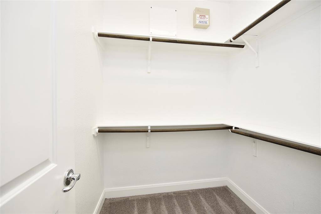 Another view of the primary closet.