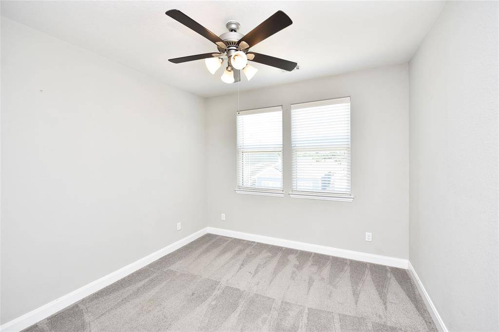 On the third floor, in addition to the primary bedroom, you'll find two nice secondary bedrooms.