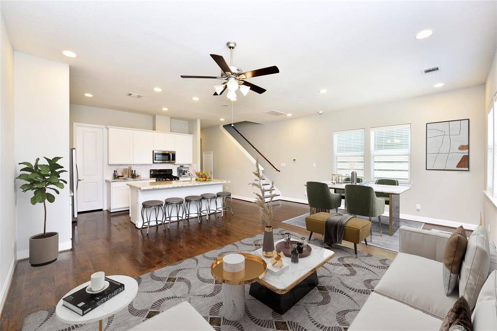 Virtually Staged Living and Dining Spaces Showcasing the Potential of the Open Floor Concept.