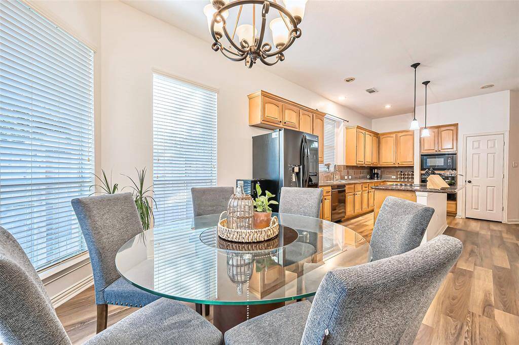 A view of the kitchen from the breakfast area