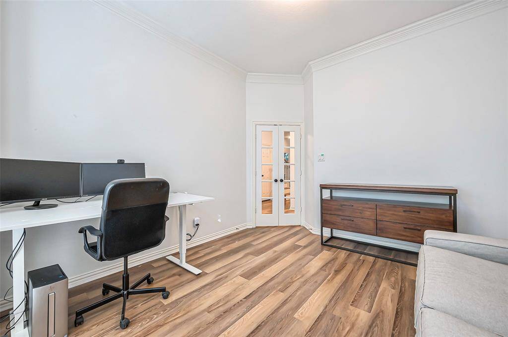 A different view of the office featuring french doors