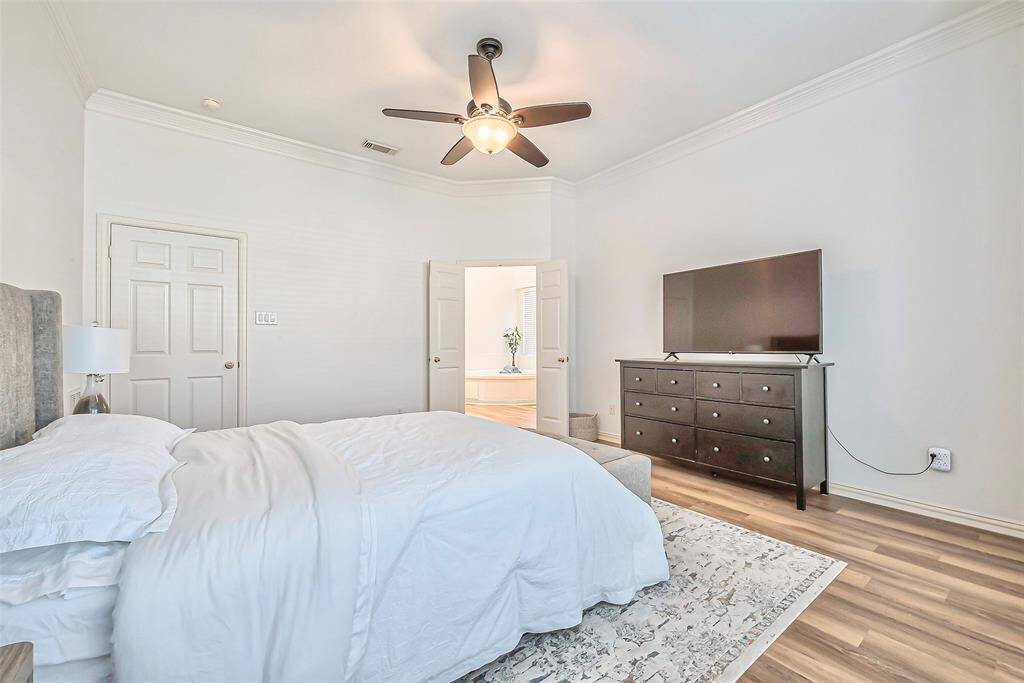 The primary bedroom features an ensuite bathroom