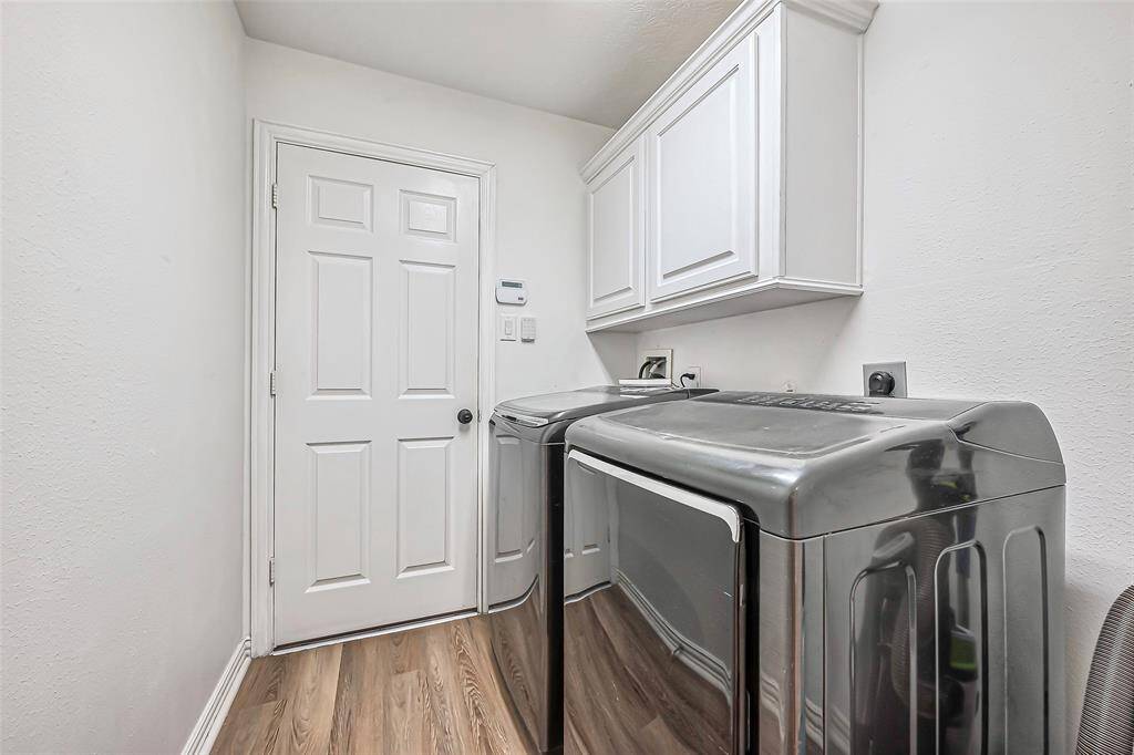 The utility room in the house has washer/dryer connections