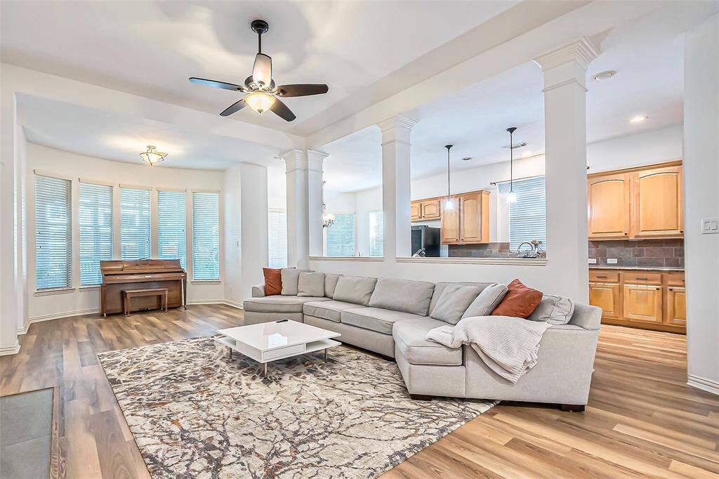This inclusive layout connects the kitchen and living room space