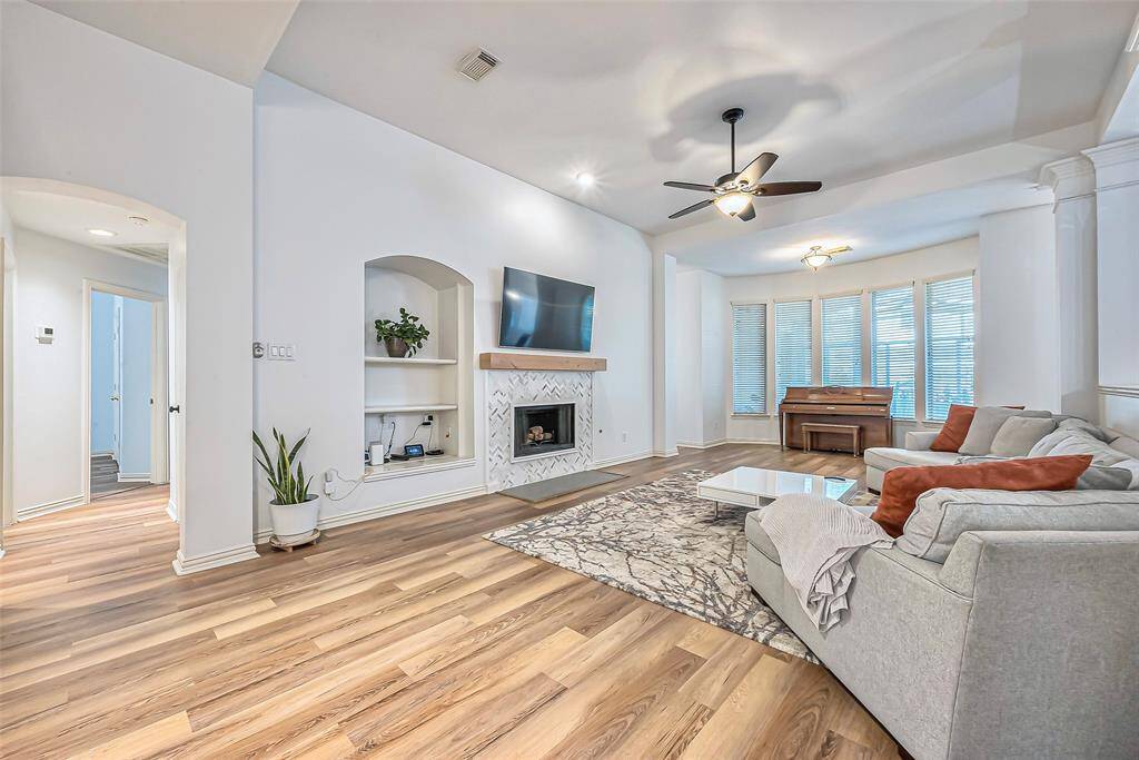 Built shelves are featured in the living room