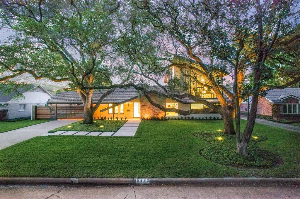 Welcome to 5686 Bayou Glen Rd! Rebuilt in 2021-2022 by an International architect with a contemporary feel and top-tier finishes, and a water filtration system.