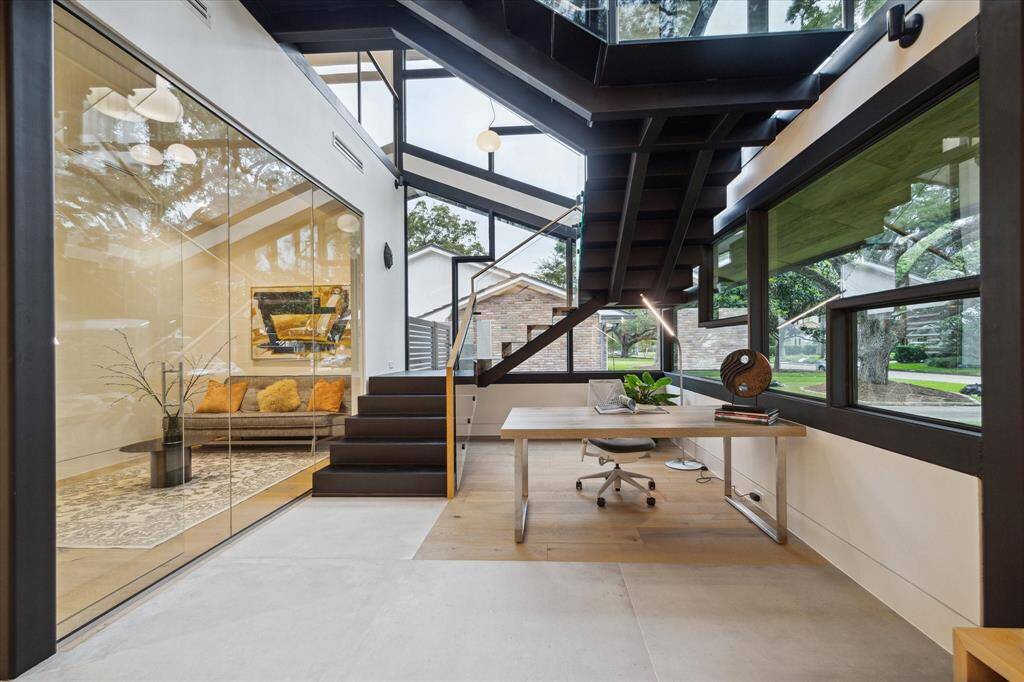 The exquisite neutral color 48" x 48" Tile Flooring by PORCELANOSA enhances the architectural design throughout the social areas.