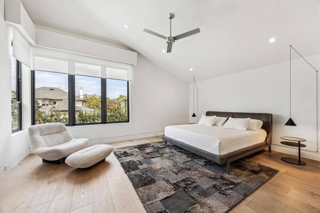 The spacious Primary Suite is located on the second floor. Features large windows with abundant natural light, 9" wide white oak wood flooring.