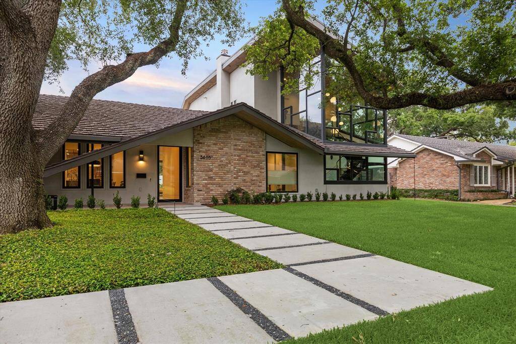 This residence was rebuilt in 2021-2022. The reinforced foundation, accent brick walls were kept from its original time.