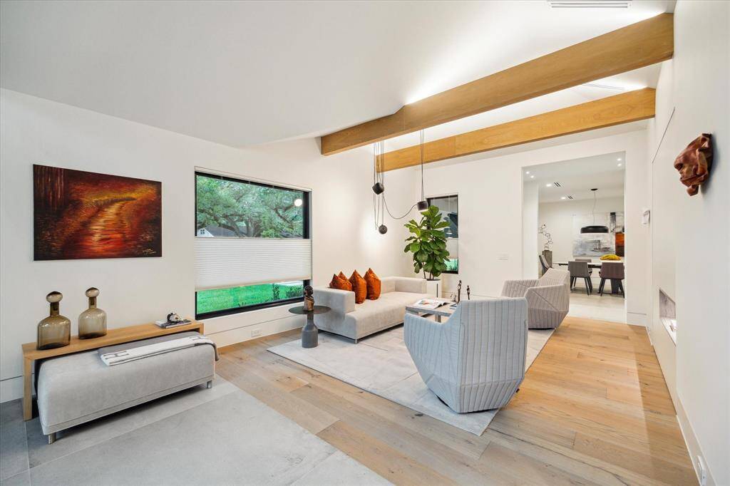 Interior Designer's dream! This room can be used as a formal living area or an open playroom. Features a built-in closet with shelves and drawers. ASK where the secret room is located?