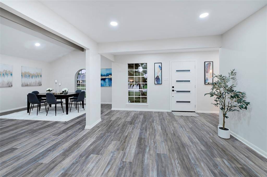 Another angle of the living area looking towards the front door.