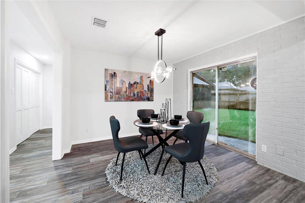 Breakfast room that opens up to the backyard--new glass sliding door to be installed!