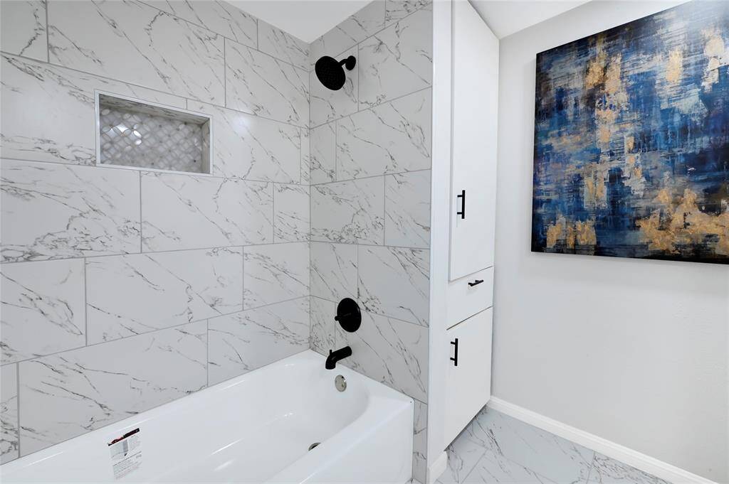 Full bath downstairs with tub/shower combo