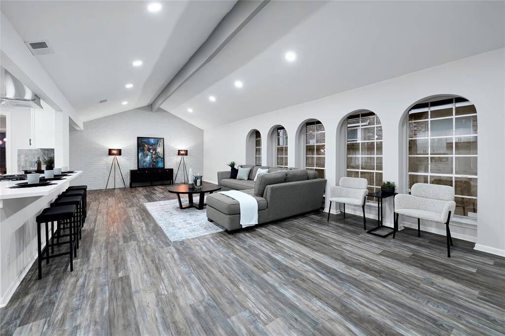 Wide open spaces in this home--living area--large family room open to kitchen and dining area.