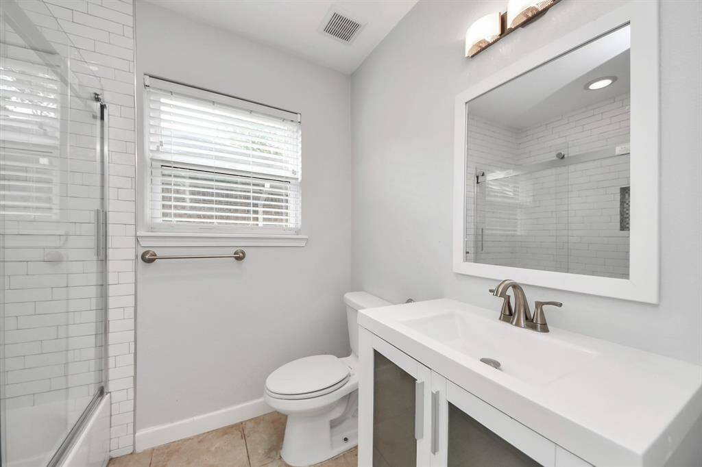 Updated secondary bathroom with ample storage