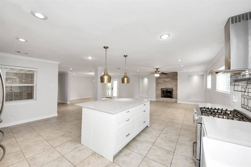 Sunlight fills the open concept layout