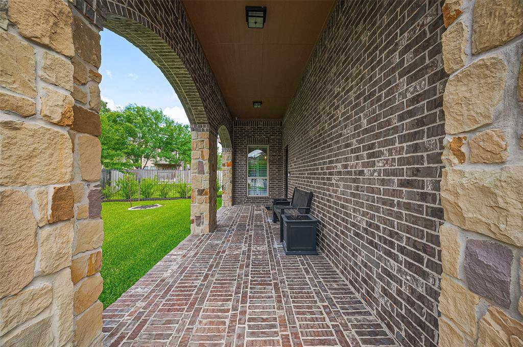 A large, covered porch with plenty of room for packages.