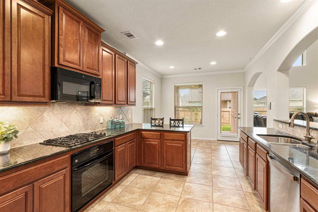 Warm-wood cabinetry.