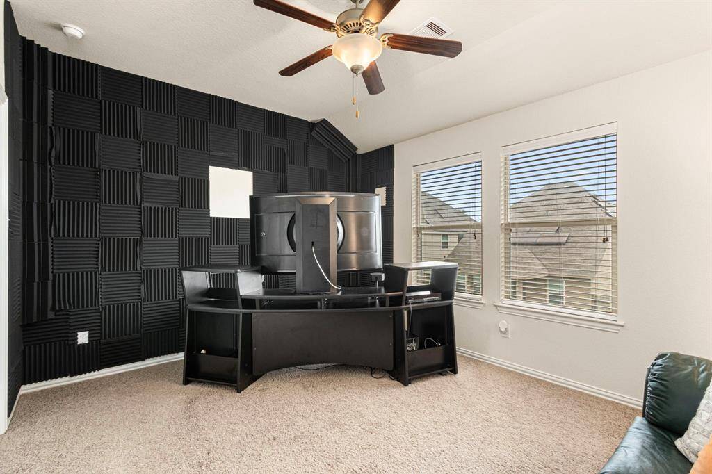Upstairs bedroom set up as an office.