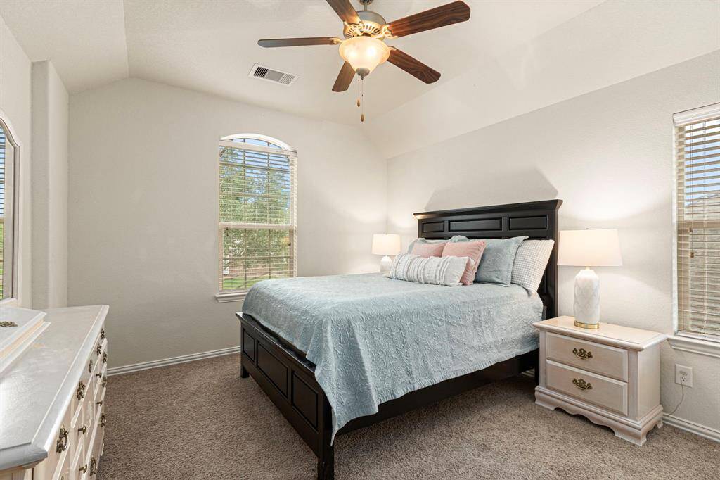 Upstairs bedroom with walk-in closet.