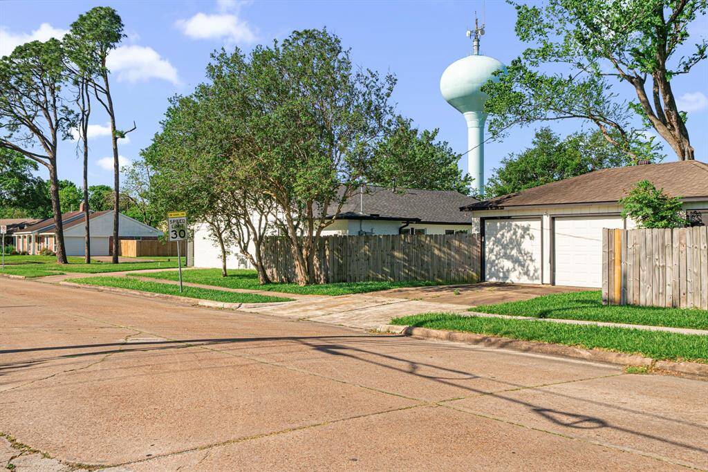 Street view showcasing garage